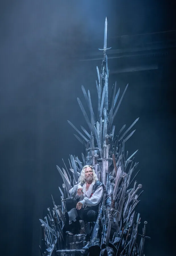 Michael Shaeffer on the Iron Throne as King Aerys Il Targaryen in the Game Of Thrones prequel play The Mad King