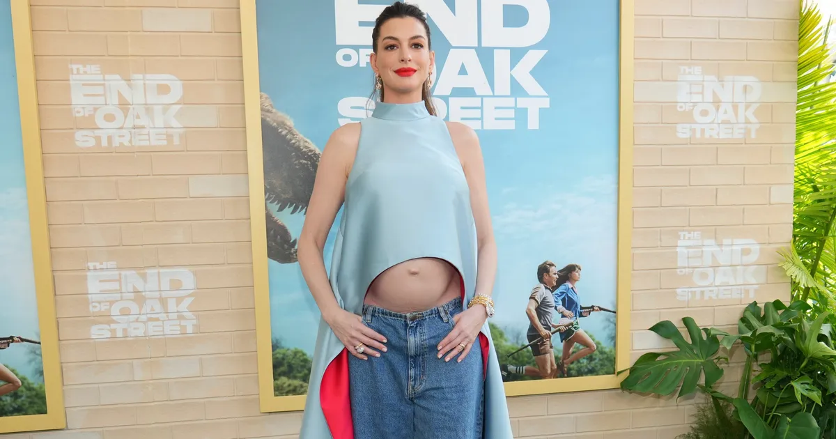 Anne Hathaway Dismisses Speculation Her Pregnancy Bump Is Fake