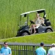 Natalie Harp pilots a golf cart at Trump’s New Jersey course.