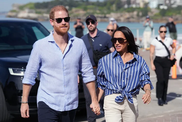 Prince Harry and Meghan Markle pictured in Australia earlier this year