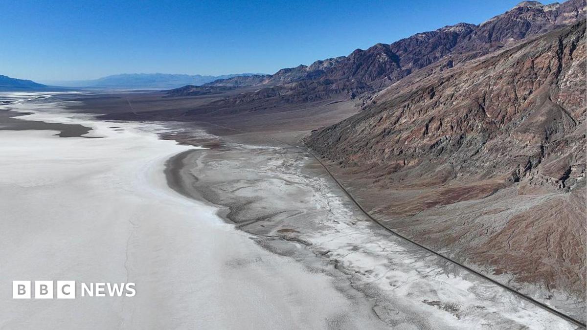 A view of Badwater Basin, a surreal salt flat, the lowest point in North America during extreme heat wave in Death Valley National Park of California, United States on August 2, 2026