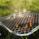 A disposable barbecue pictured in a park