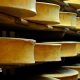 Beaufort cheese wheels stored in a cellar in eastern France. Archive photo