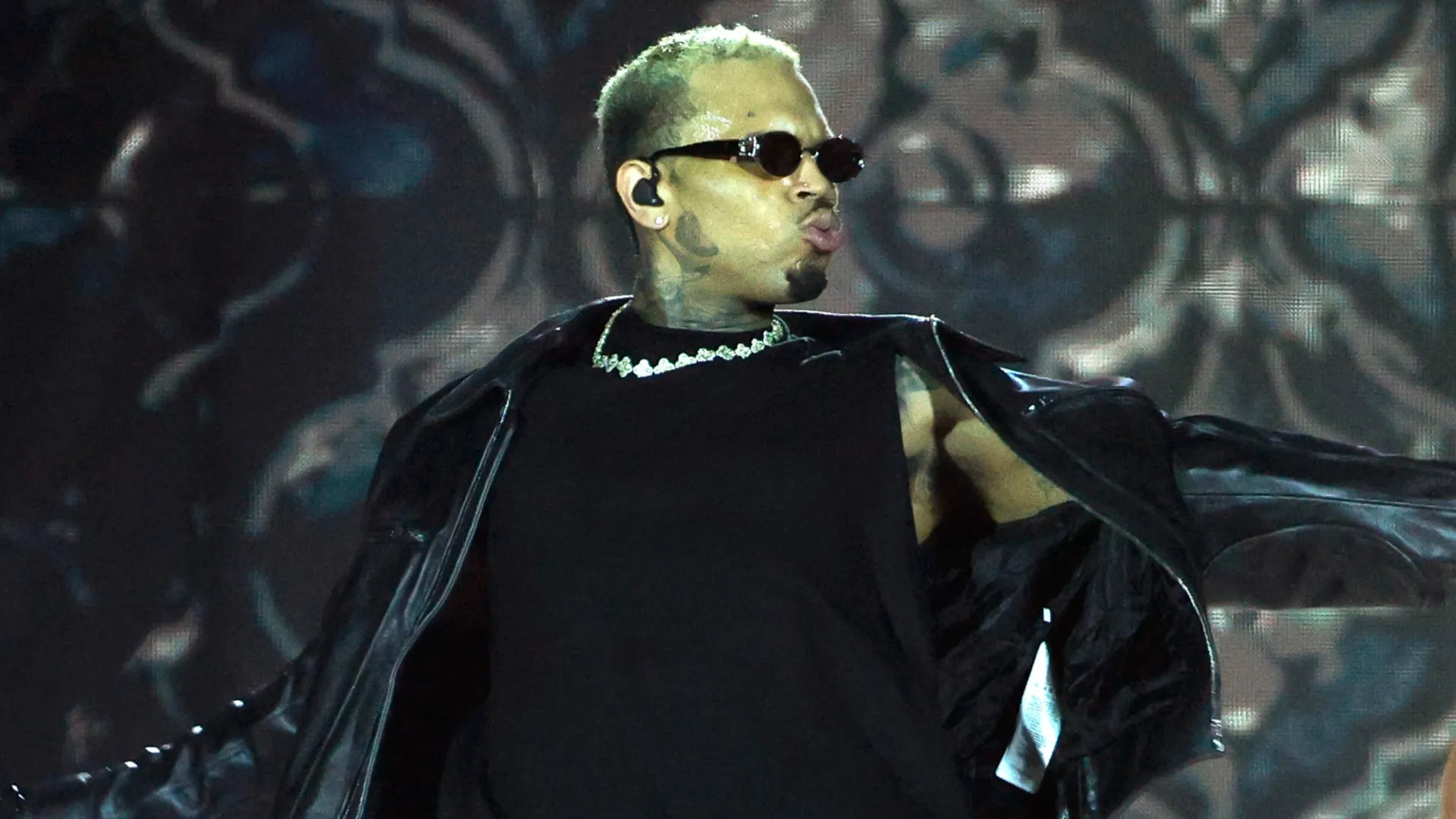 Chris Brown fan stage spicy performance clapping cheeks pulling hair ponytail Toronto Canada concert The R&B Tour