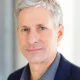 Ripple co-founder Chris Larsen faces Flock protest
