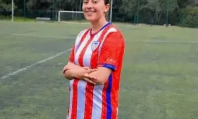 Faten Ben Omar El Azizi smiles on the football pitch in her kit, with her arms crossed. Others died too trying to swim to Ceuta.