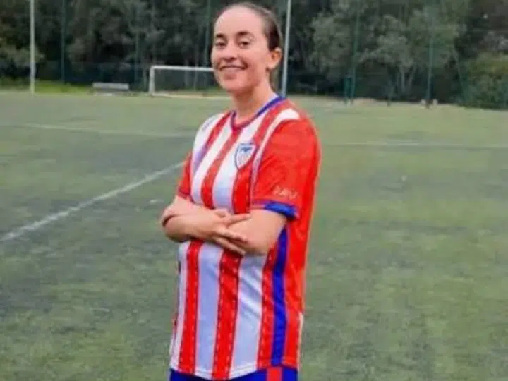 Faten Ben Omar El Azizi smiles on the football pitch in her kit, with her arms crossed. Others died too trying to swim to Ceuta.
