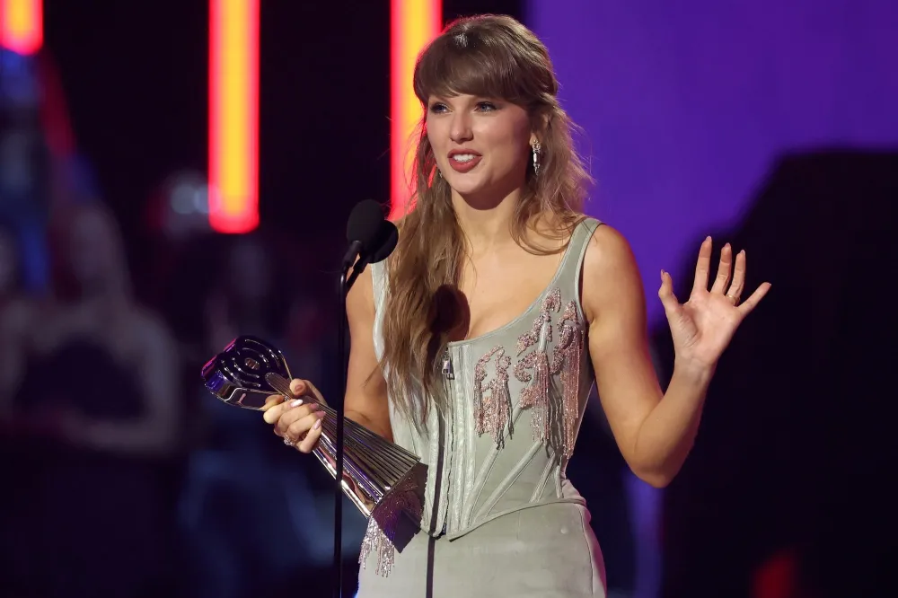 GettyImages-2268539961 Taylor Swift Reveals Tim McGraw Song Easter Eggs That Predicted Her Life Now After Travis Kelce Wedding