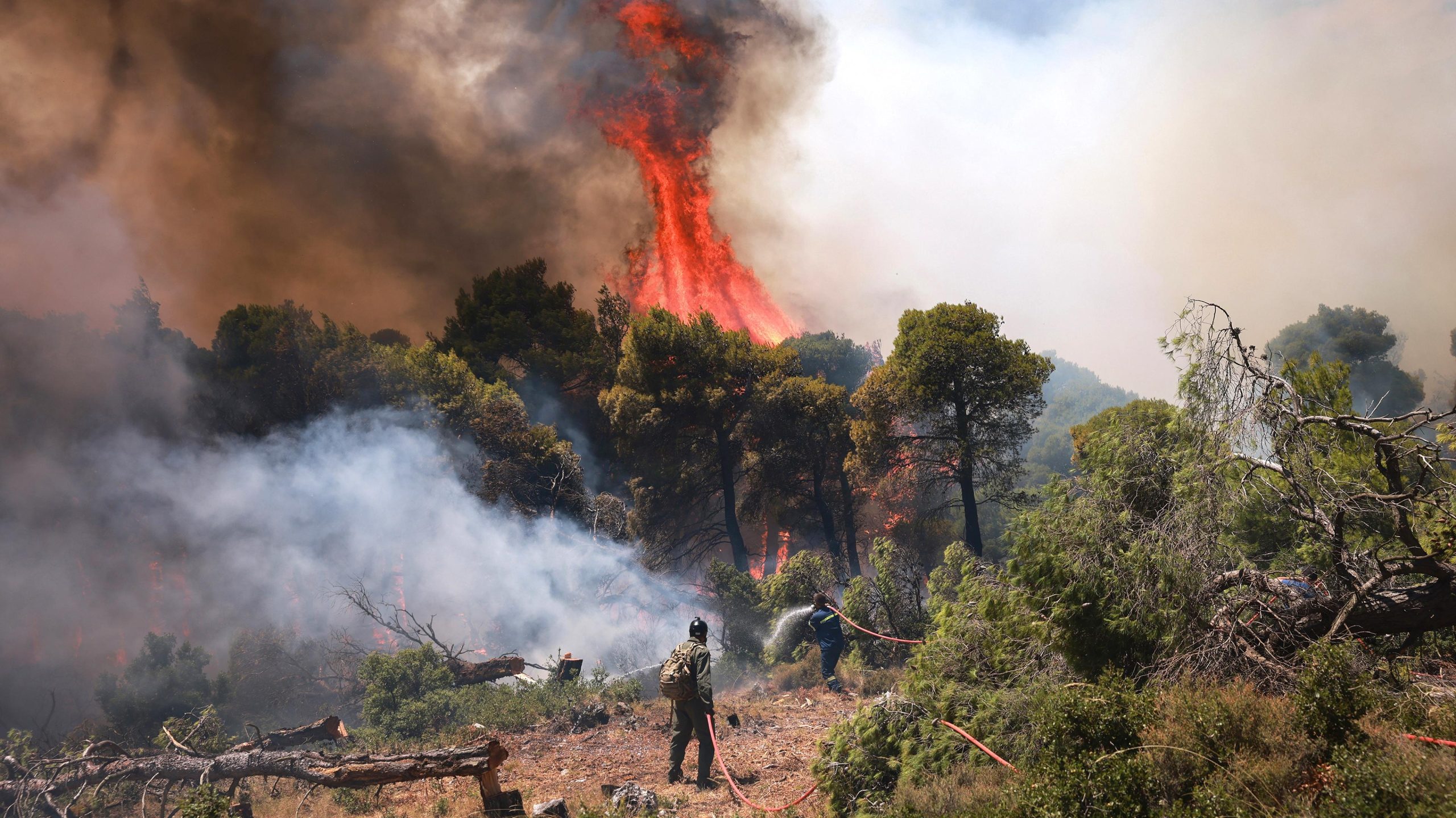 Greece Battles Raging Wildfires After Collision Between Firefighting Helicopters Kills Two