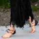 Margaret Qualley Frees Her Toes in Barefoot Chanel Shoes