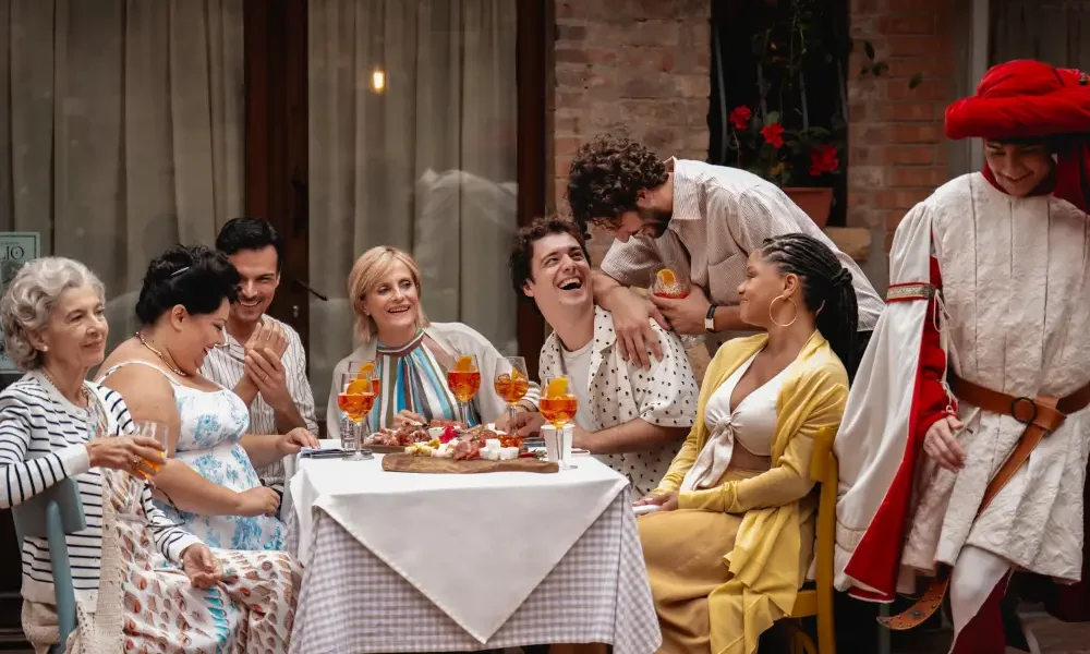 You, Me & Tuscany (from left) Nonna Alessia (Stefania Casini), Francesca (Stella Pecollo), Leo (Luca Setaccioli), Gabriella (Isabella Ferrari), Enzo (Tommaso Cassissa), Matteo (Lorenzo de Moor) and Anna (Halle Bailey) in You, Me & Tuscany, directed by Kat Coiro.