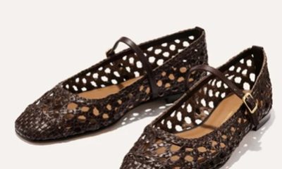A pair of brown woven leather flats