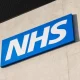 NHS sign on a wall LeDeR