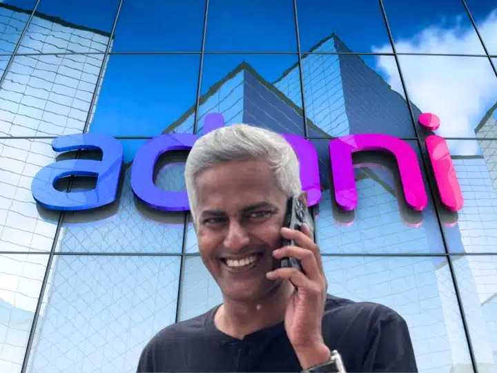 Composite image showing headshot of Ravi Nair in front of facade of Adani office building