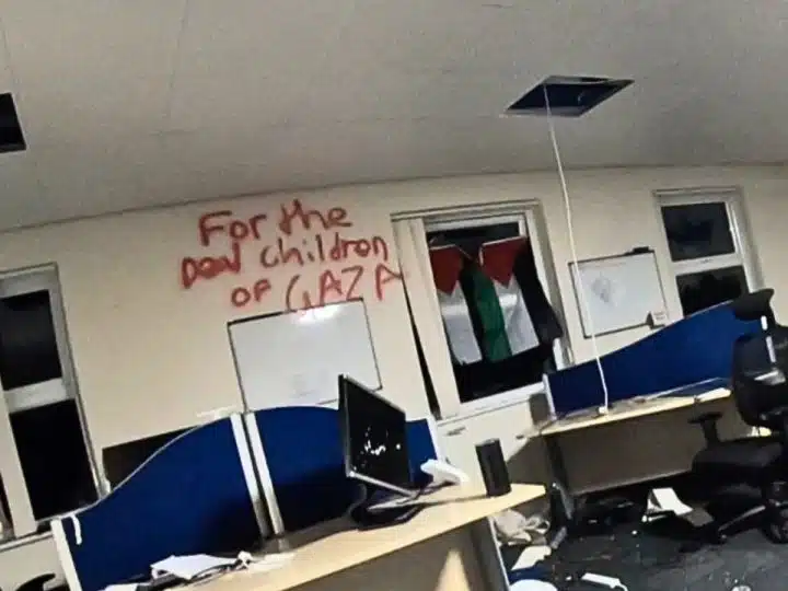 Ultra I&C Aberdeen office - image shows damage and graffiti reading For The Dead Children Of Gaza