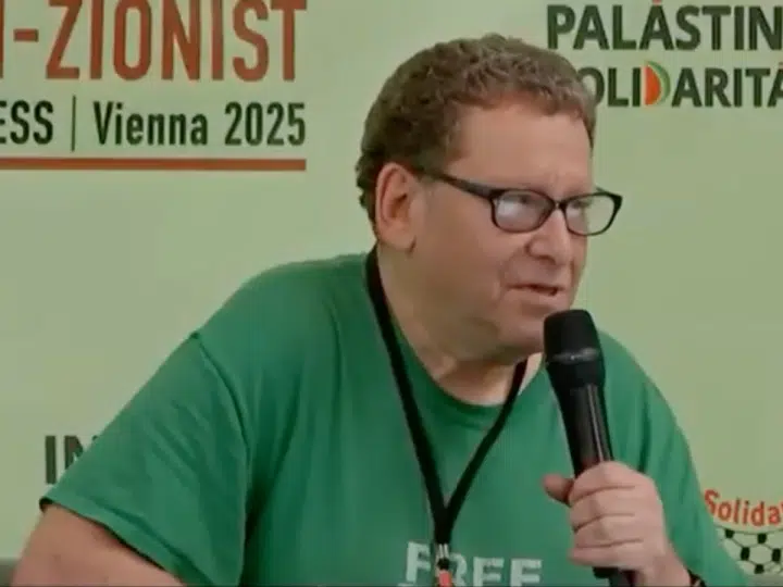 A screenshot of a video of Tony Greenstein delivering a speech at anti-Zionist Jewish Congress in Vienna in 2025