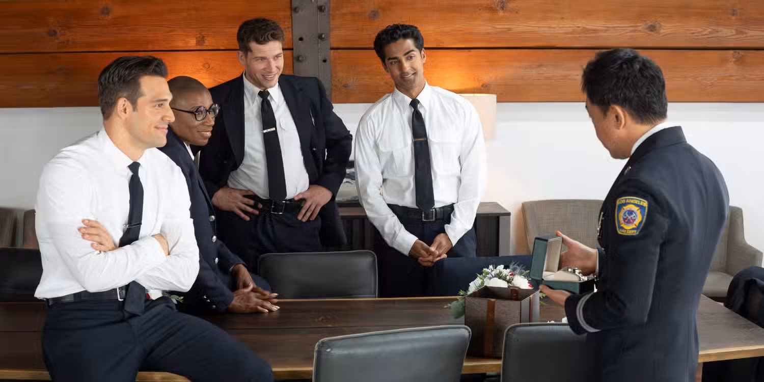 Eddie, Hen, Buck, and Ravi giving Chimney a gift in 9-1-1 Season 9