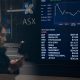 Aussie shares dip as banks and retail stocks drag
