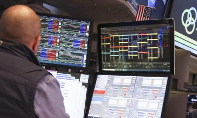 Wall Street ends higher as Amazon soothes AI jitters
