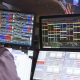 Wall Street ends higher as Amazon soothes AI jitters