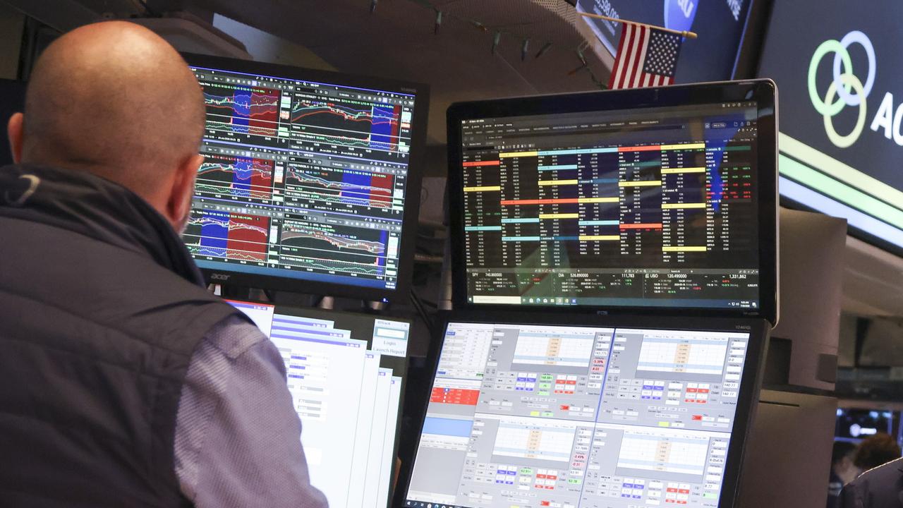 Wall Street ends higher as Amazon soothes AI jitters