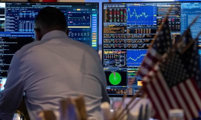 Wall St slips as investors weigh data, Iran tensions