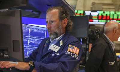 Wall St rallies, Dow closes at record on Iran optimism