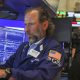 Wall St rallies, Dow closes at record on Iran optimism