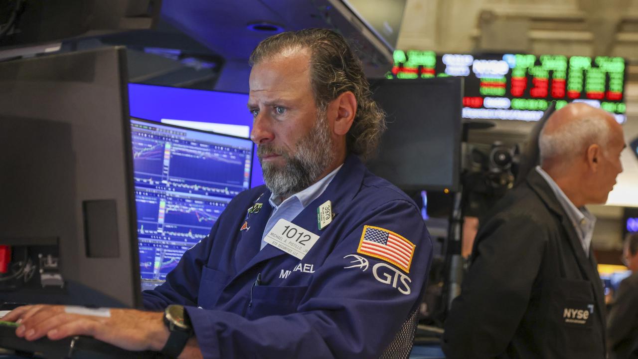 Wall St rallies, Dow closes at record on Iran optimism