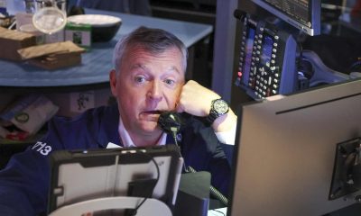 Wall St jumps on AI-linked earnings and Iran deal hopes