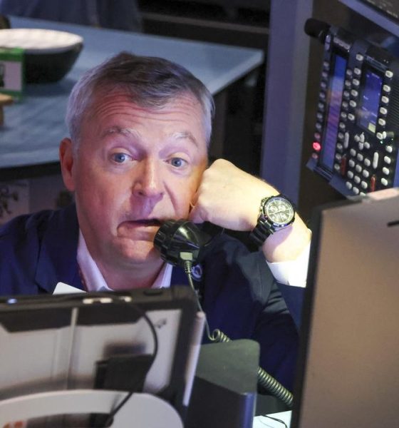 Wall St jumps on AI-linked earnings and Iran deal hopes