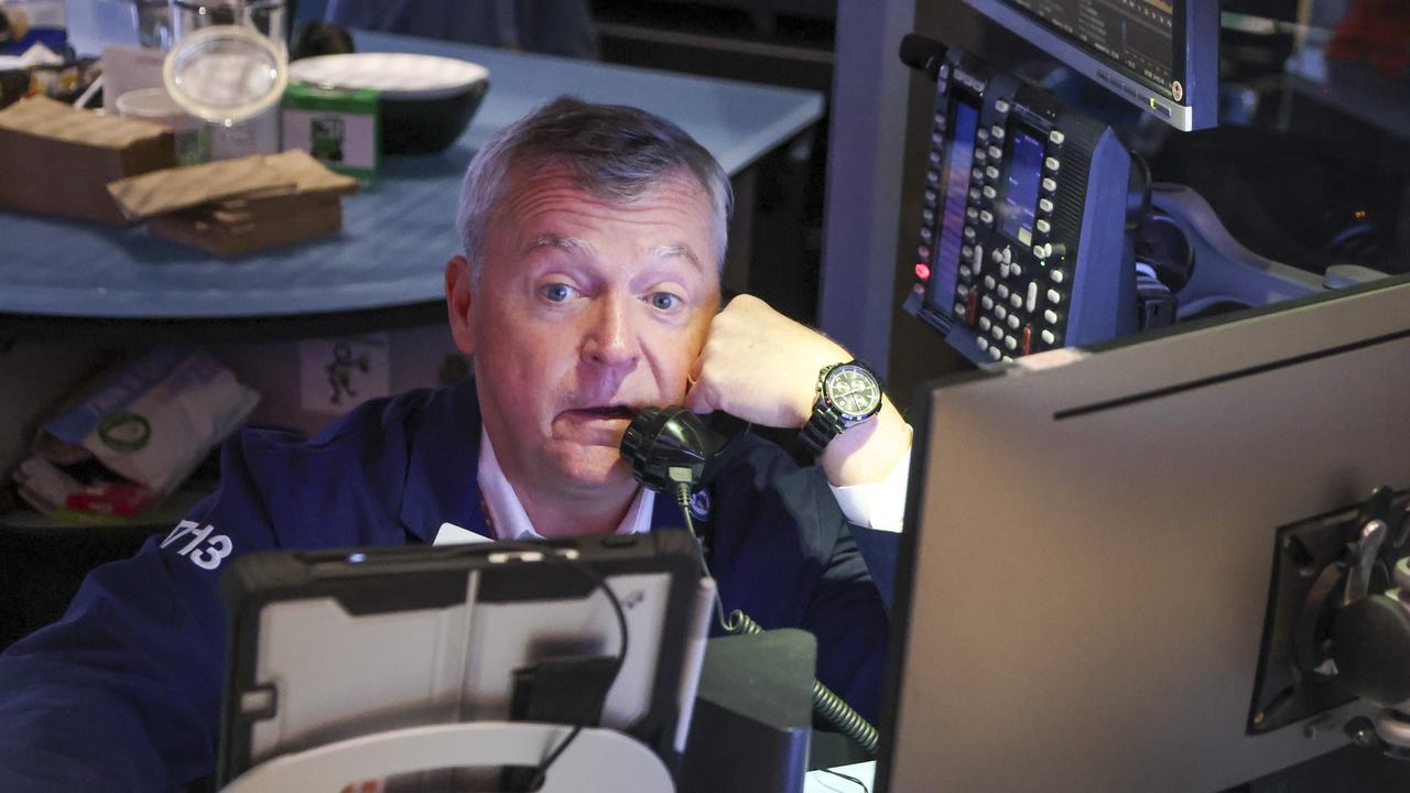 Wall St jumps on AI-linked earnings and Iran deal hopes