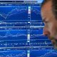Wall St dips as investors monitor Iran talks, earnings