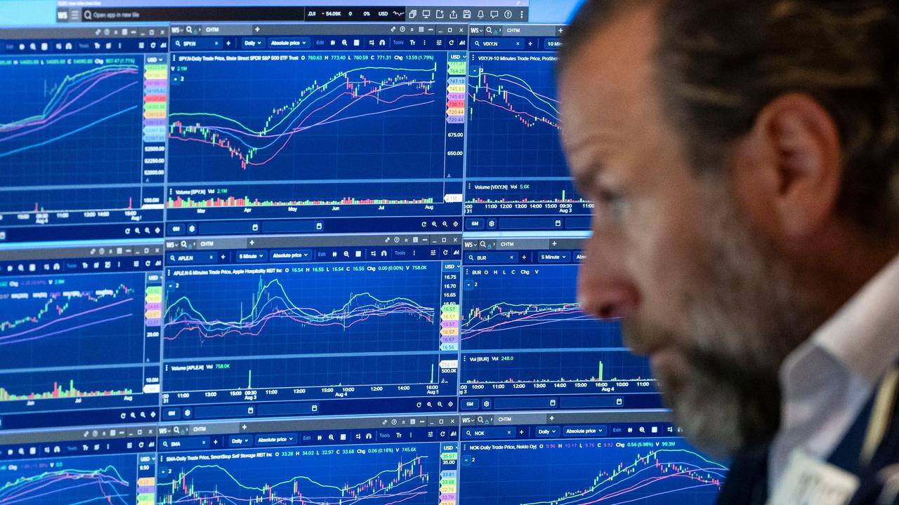 Wall St dips as investors monitor Iran talks, earnings
