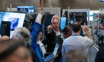 Wall Street rises amid focus on bond yields and Iran