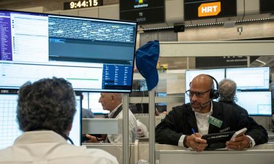 Wall Street closes lower as US bond yields rise