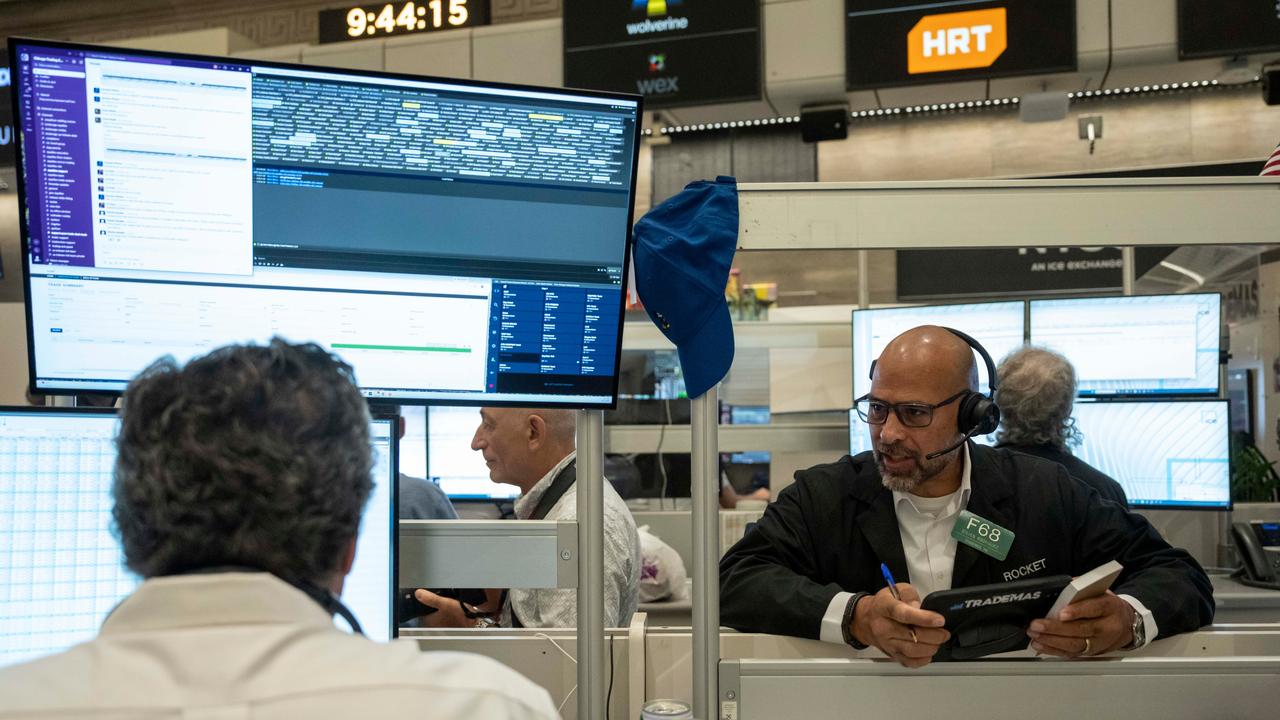 Wall Street closes lower as US bond yields rise