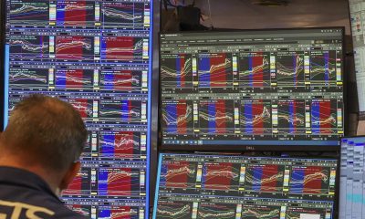 Wall Street ends lower following hot inflation data