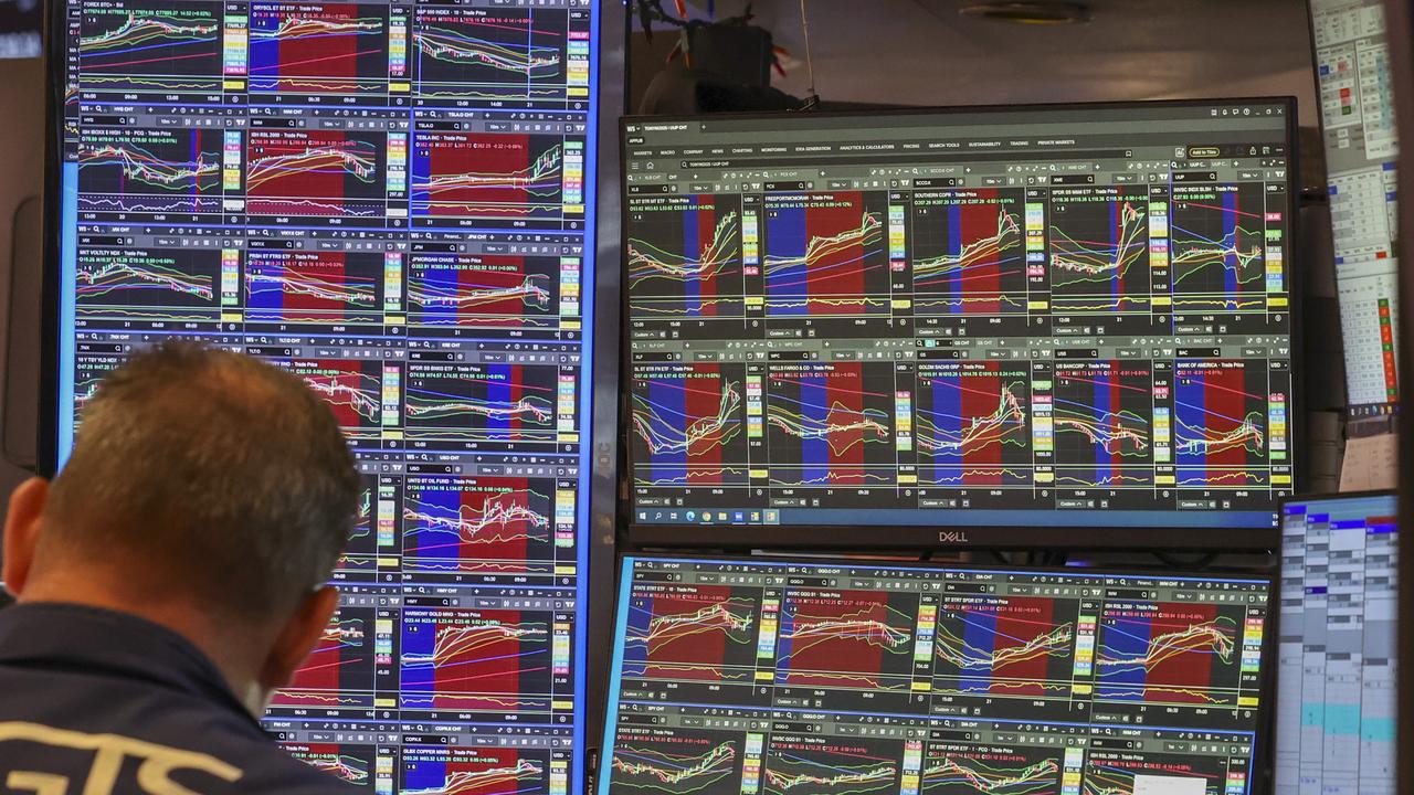 Wall Street ends lower following hot inflation data