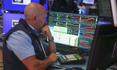 Wall St ends lower as Warsh reaffirms inflation fight