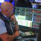 Wall St ends lower as Warsh reaffirms inflation fight