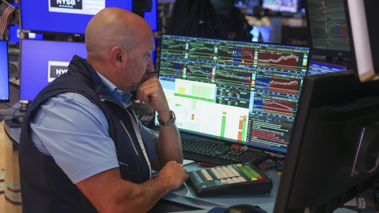 Wall St ends lower as Warsh reaffirms inflation fight