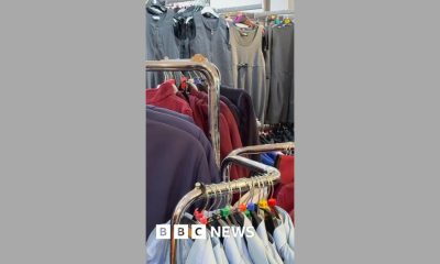 School uniforms hanging on clothes rail