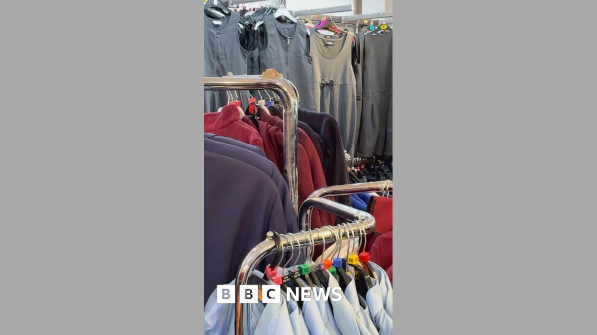 School uniforms hanging on clothes rail