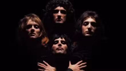 Freddie Mercury, John Deacon, Brian May, and Roger Taylor of Queen in the 'Bohemian Rhapsody' music video.