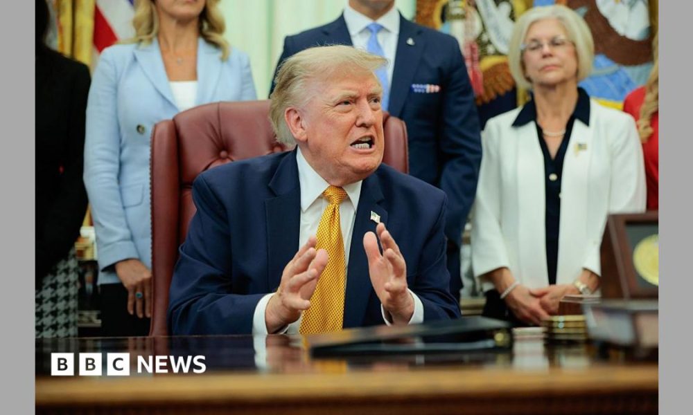 US President Donald Trump speaks to the media after signing an executive order establishing the President's Military Spouse Commission in the Oval Office at the White House on August 03, 2026 in Washington, DC.