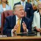 US President Donald Trump speaks to the media after signing an executive order establishing the President's Military Spouse Commission in the Oval Office at the White House on August 03, 2026 in Washington, DC.