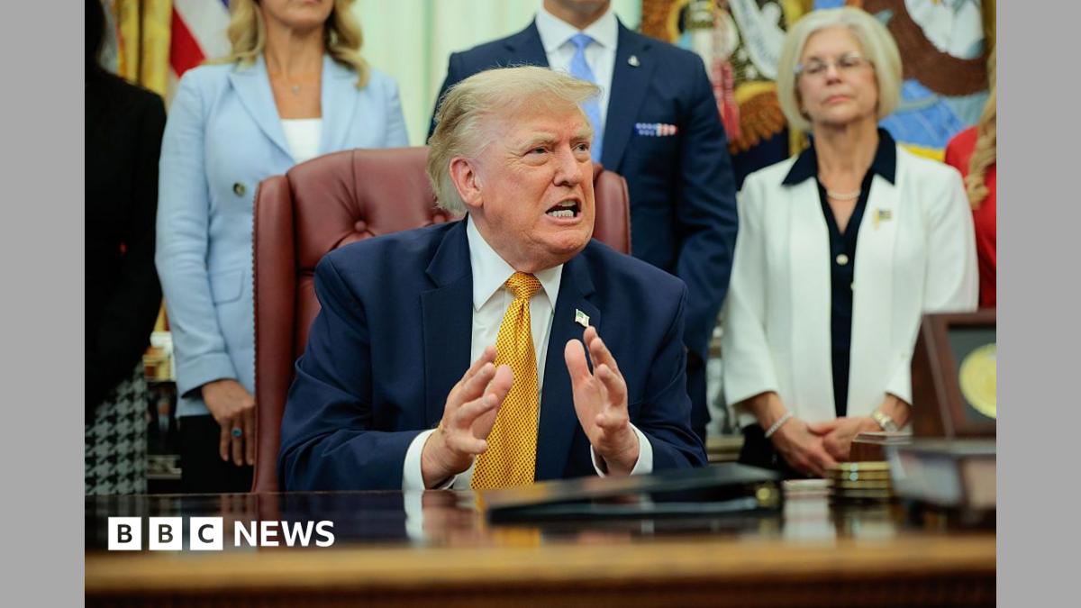 US President Donald Trump speaks to the media after signing an executive order establishing the President's Military Spouse Commission in the Oval Office at the White House on August 03, 2026 in Washington, DC.