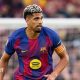 Ronald Araujo looks on while playing for Barcelona against Espanyol in April 2026