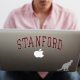Chris Barber, a student at Stanford University, uses a laptop computer in his dorm room in June. The Free Application for Federal Student Aid (FAFSA) became available online Thursday morning.